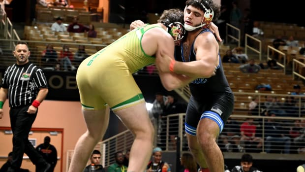 Sawyer Bartelt of South Dade wins the 215-pound championship, 8-1, against Aaron Riner of Buford on Saturday at the Knockout Christmas Classic at Silver Spurs Arena in Kissimmee. 